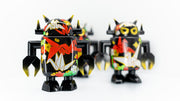 Black spray painted Big Boss Robot figures, with gold, white, red and green color accents. Their robot body features designs of paper cranes, as well as small leaf and flower iconography.