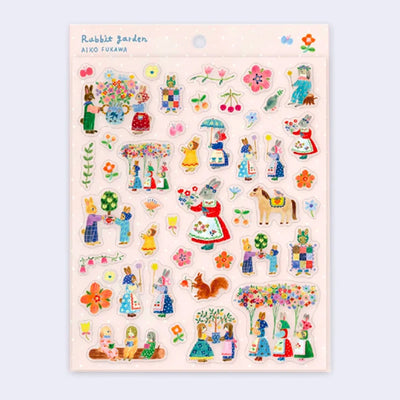 Sticker sheet with many die cut stickers of rabbits in dresses and plant themed stickers, such as flowers, leaves and trees.
