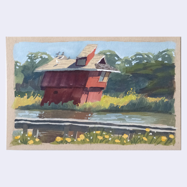 Plein air painting of a red building, very close to a lake with marshy vegetation around it and a road divider in the foreground.