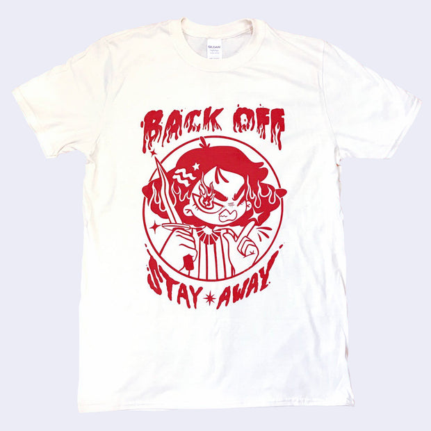 Off white t-shirt with a red illustrated graphic of a girl holding a knife and pointing a finger. Text around reads "Back off / Stay Away"
