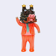 Vinyl figure of a pink man with a balding head and a bright pinstriped business suit.  He wears a large black dragon head with gold color accents.