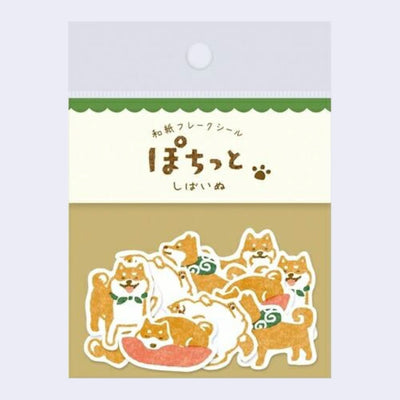Flake sticker set with many small stickers of brown shiba inu dogs, either sleeping or happily playing.