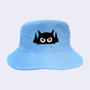 Baby blue bucket hat with a black embroidered logo of a robot head, with white angry eyes.