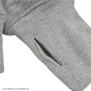 Detail of jacket sleeve, with a hole for the thumb.