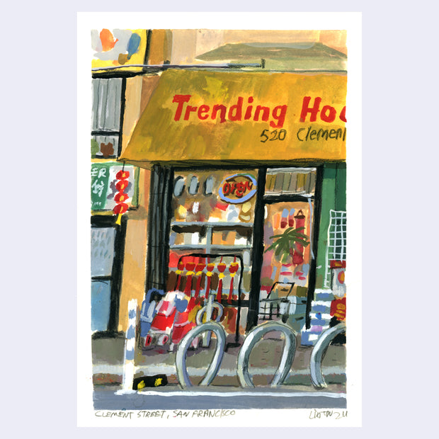 Plein air painting of a shop with bike parking out in front. Store has a yellow awning and red lanterns hanging from the front.