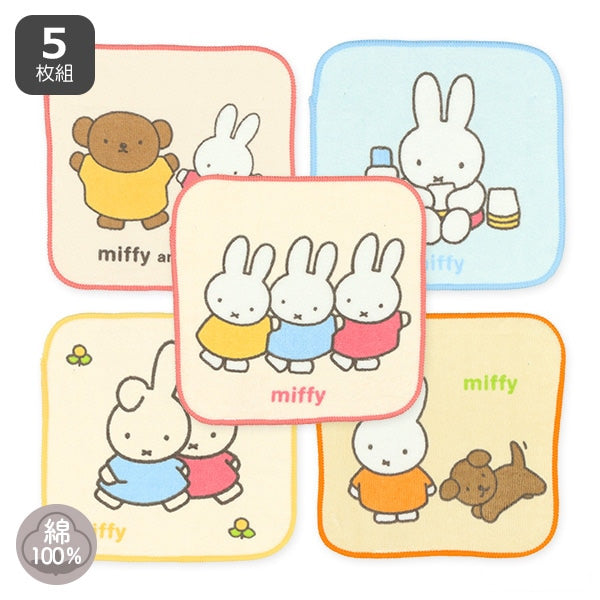 5 different patterned towels of Miffy characters. Designs are: Boris and Miffy, Miffy eating lunch, 3 Miffy's standing, 2 Miffy's walking, and Miffy playing with a dog.