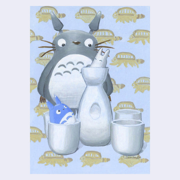 Illustration of a set of white sake cups, with a matching bottle. A stylized Totoro stands in the back, with 2 small chibi totoros in the cups. Background is a pattern of Catbus running.