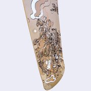 Tan skatedeck featuring illustration of a woman with a dragon over her, with its head stacked atop hers and and its body following behind. It has a curly mane, wooden antlers and scales. Clouds are around the pair. Close up.