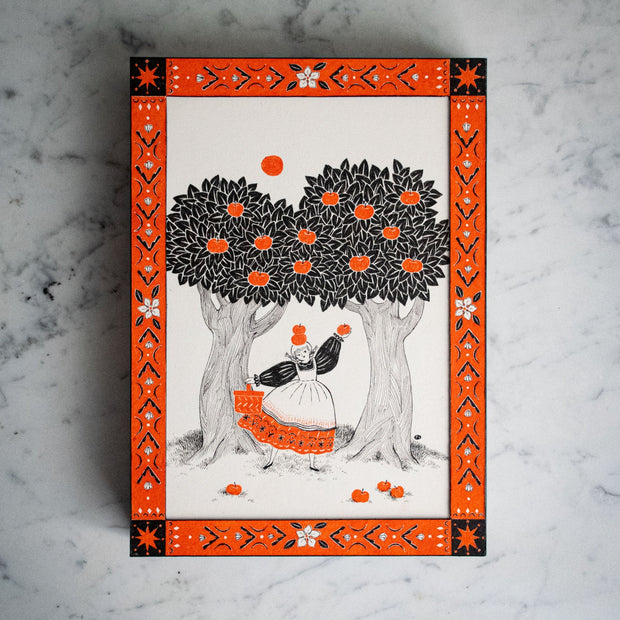 Illustration using only black and orange paint/ink of a woman in a hoop dress with 2 apples stacked atop her head, carrying a bag with extended arms under 2 apple trees. Apples are on the ground and the piece has a drawn flower and geometric pattern border.