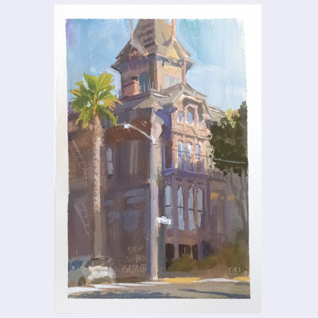 Plein air painting of a tall tan older style building. A large palm tree is next to it. Graffitied on the side reads "stop bombing gaza" with a peace symbol.