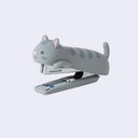 Gray cat-shaped stapler on a light gray background