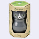 Cat shaped planter with a separately attached head, enclosed in its product packaging.