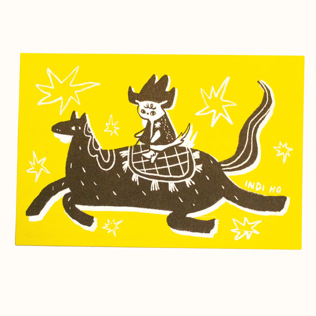 Risograph postcard of a small white dog sitting atop of a horse riding like a cowboy. Background is yellow.