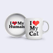 A set of cat bowl and coffee mug. Bowl reads "I Love (tolerate) My Human" and mug reads "I Love My (Asshole) Cat"