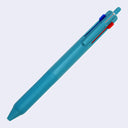 Teal blue ballpoint click pen with 3 ink colors: the main click is black, and 2 side sliding clicks are blue and red.