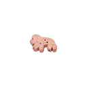 Small ceramic figurine of a pink frosted animal cookie with sprinkles, shaped like a lion.