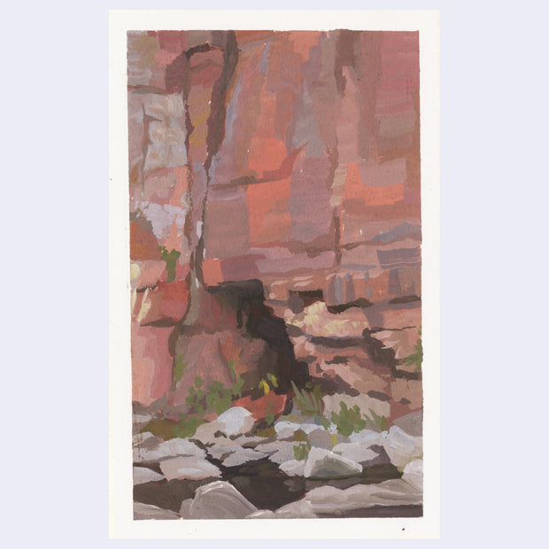 Plein air painting of a red rock wall formation with a lake at the bottom. Several gray rocks sit in the lake.