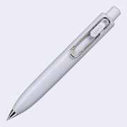 Thick, short lavender colored pen with a side clip and a silver pen opening.