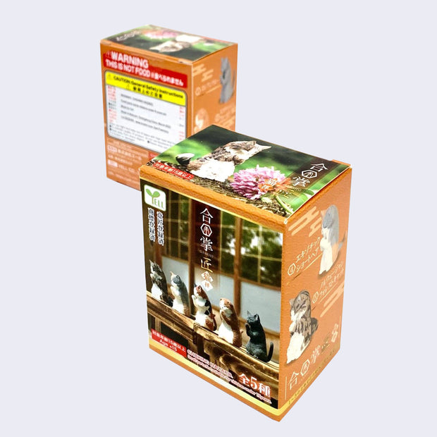 Front and back view of product packaging for Bowing Cats blind box.