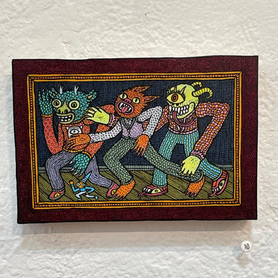 Illustration on wood with a red and gold border. Framed image is of 4 variously designed goblins, all dressed in patterned sweaters and pants, with long arms seemingly in step with one another.