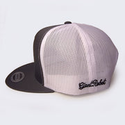 Side view of gray baseball cap. The entire back side of cap is white mesh. Cursive text embroidered on left side of cap says giant robot.