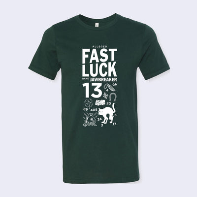 Front side of forest green t-shirt. Bold white text says alleged fast luck band. Scattered below text are drawings of lucky and unlucky items.