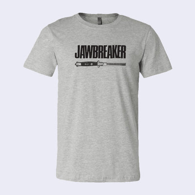 Front side of heather gray t-shirt. Black text in all caps says Jawbreaker. A switchblade comb lays underneath text.