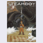 Poster for "Steamboy," which is written stylistically on top. A man in an all brown uniform stands with chest straps, goggles and a skull cap in the middle of a steaming room with huge black machine pipes behind him. 