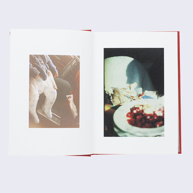 Open two page book spread of slightly over exposed photographs with thick white page borders. Left is of a close up of a baby's feet in a onesie. Right is a leftover bowl of red gooey food.