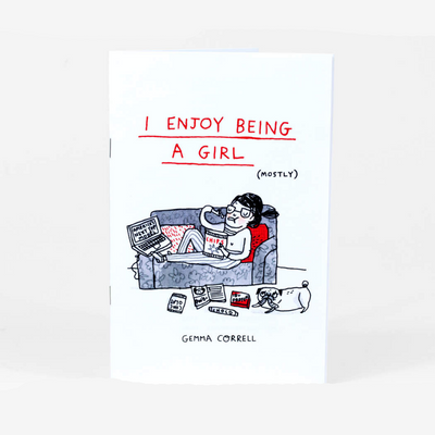 Staple bound zine on white paper featuring an illustration of a woman laying on her couch, watching TV on her laptop and eating chips. Title reads "I Enjoy Being a Girl" in red font and "mostly" written nearby in small parentheses.