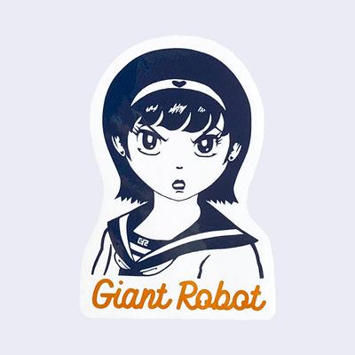 White cut out sticker with an illustration of a dark blue manga girl with an angry expression, "GR" is written on the collar of her sailor-style shirt. "Giant Robot" is written in orange cursive font below the design.