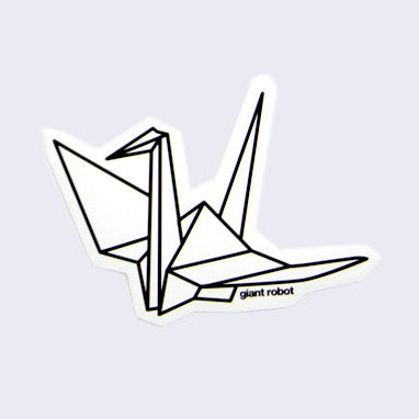 White cut out sticker of an origami paper crane. "Giant Robot" is written in small lowercase font below the right wing.