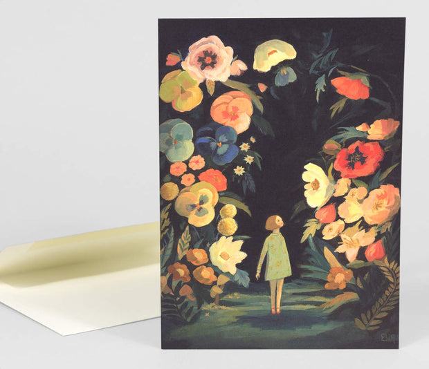 The front of note card is shown with an envelope behind it. The notecard has an illustration of a tiny girl surrounded by enormous flowers.