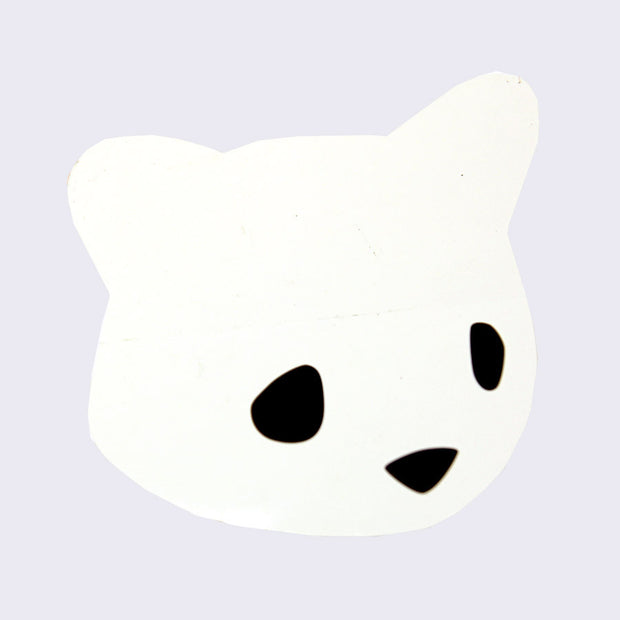 White die cut sticker of a simplified cartoon bear head, with only black eyes and a nose.