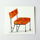Drawing of an orange fabric chair with exposed steel and flower patterns.