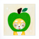 A square felt art piece featuring a cute yellow and white chihuahua peeking out from a green apple-shaped head with a dark brown stem and green leaf, set against a cream background with small white star accents.
