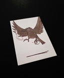 A square white art print featuring a brown ink illustration of a raven in flight holding a string, displayed on a solid black background.