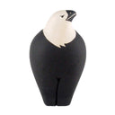 Black and white bird figurine on a white background
