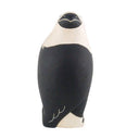 Black and white ceramic eagle figurine on a white background