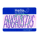 A rectangular sticker with rounded corners, featuring a blue header that reads 'Hello my name is' with a small white ghost illustration. The center shows the name 'AUGHOSTUS' in large purple wavy letters over a white background with pink and green scribbled accents.