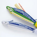 Two fish-shaped pencil cases on a white background