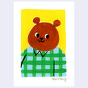 A minimalist artwork featuring a cartoon bear character with a brown bear head, set against a bright yellow background and wearing a green and blue plaid shirt. 
