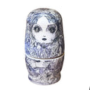 Set of 5 nesting dolls with ballpoint ink illustrations on each of them.