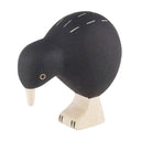 Black and white bird figurine on a white background