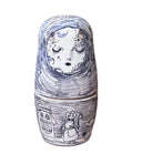 Set of 5 nesting dolls with ballpoint ink illustrations on each of them.