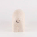 White polar bear figurine on a white background