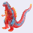 A translucent resin Godzilla figure with a red and blue color scheme and orange highlights, shown against a plain light gray background.