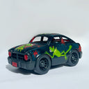 Small black toy car with a painting of Kermit the Frog on the front, roof and asides with red star patternings.