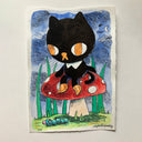 Illustration of a black cat character sitting on a red mushroom with grass around.