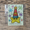 Illustration of a cartoon yellow star with a pointy party hat, many stars and text that reads "A menace to society"